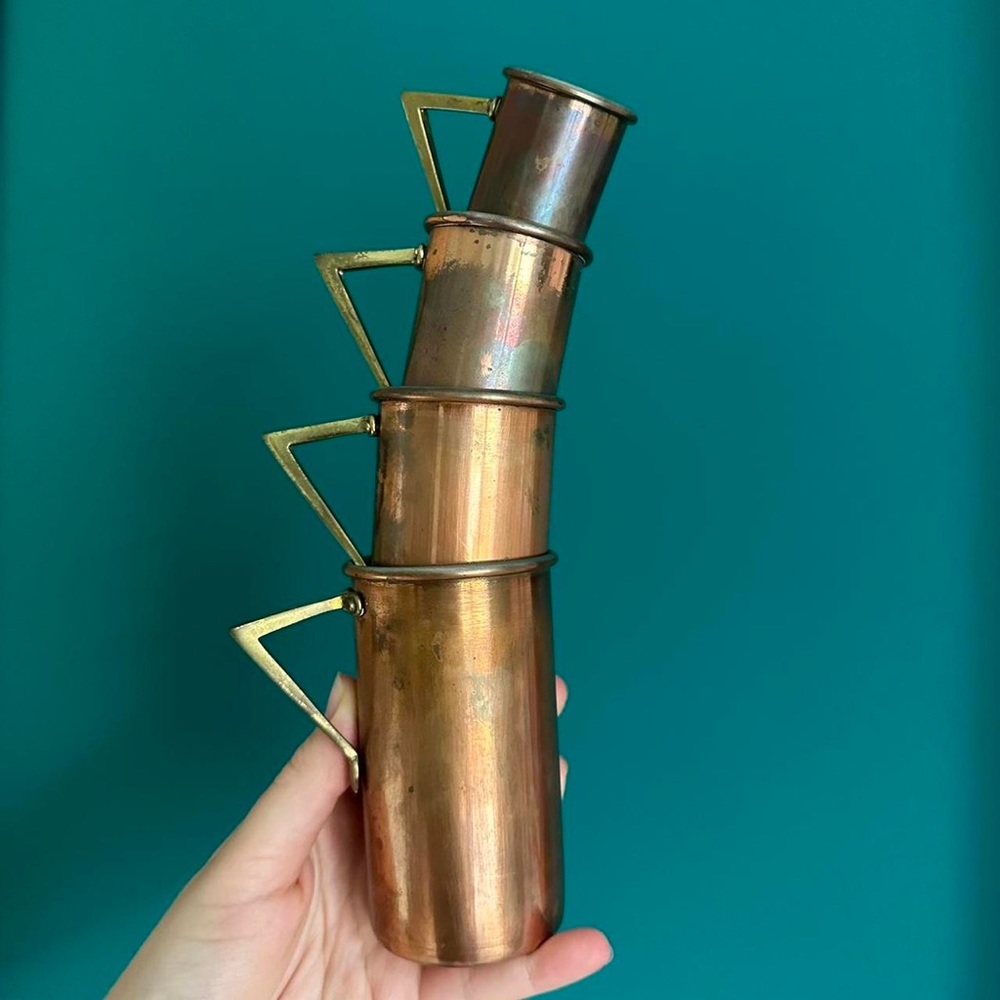 Art deco Vintage copper & brass measuring cup set.